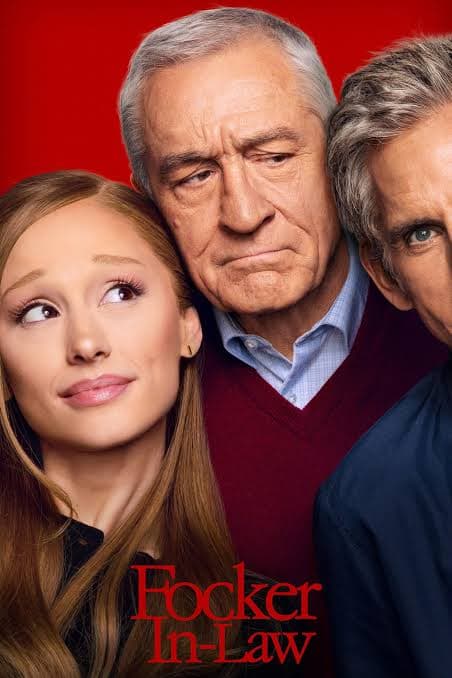 Robert De Niro looks sternly between a smiling woman and Ben Stiller against red.